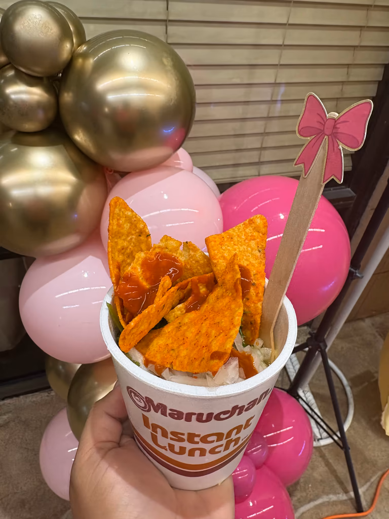Ramen with toppings at event